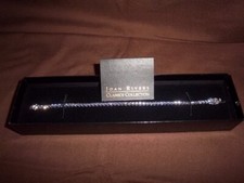 Joan Rivers, Classics collection. Simulated Tanzanite Tennis Line Bracelet. 19cm