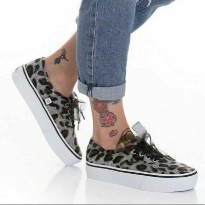 womens black and white slip on vans
