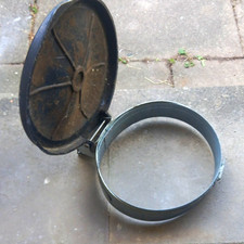 Wall-mounted circular galvanised steel bin liners holder. approx 14in diameter