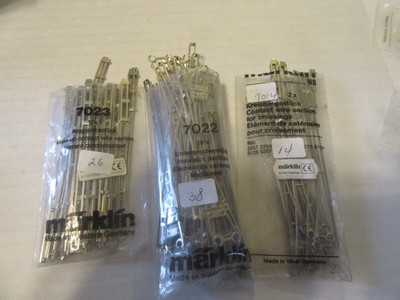 78  pcs of assorted HO scale Märklin catenary. #7014, 7022, 7023