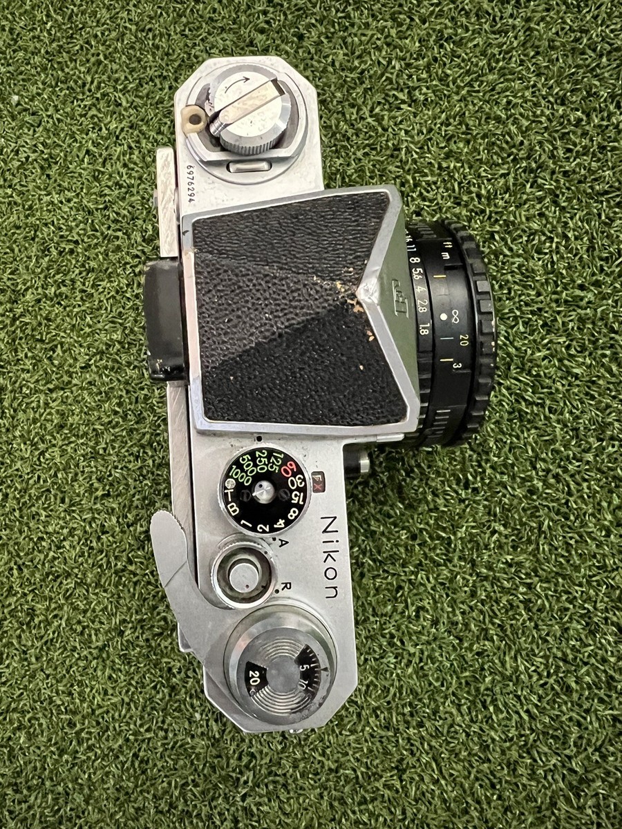 Nikon F with Eye Level Prism and a 50mm 1:1.8 Lens | eBay