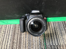 Canon EOS Rebel T100 DSLR Camera with EF-S 18-55mm f/3.5-5.6 Lens 