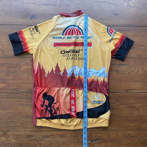 Yellow, red, and black JLvelo men’s 2012 cycling jersey with mountain and forest graphic, “Think Globally Ride Local” text, and sponsor logos.