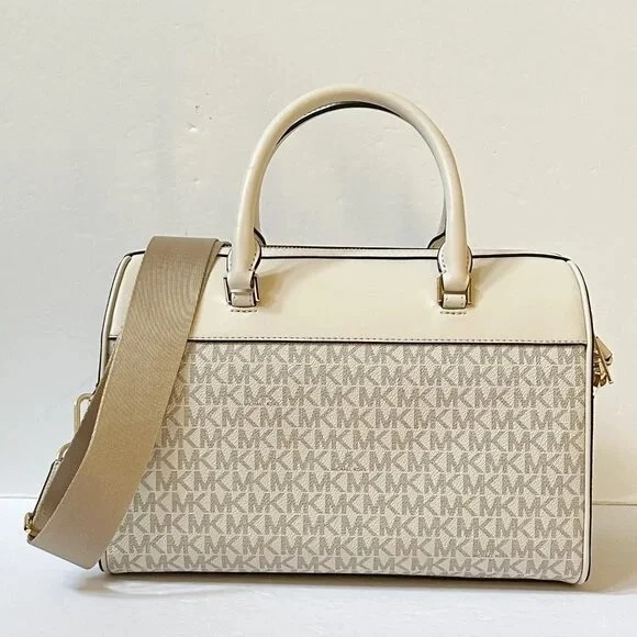 Bolso de viaje mediano Michael Kors MK Jet Set en crema claro Foto 3 de 4