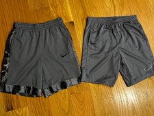 Boys Two pairs of gray Nike shorts, size boys large