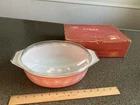 vintage Pyrex "Pink Daisy" 2 1/2 quart oval casserole dish with a Glass Lid