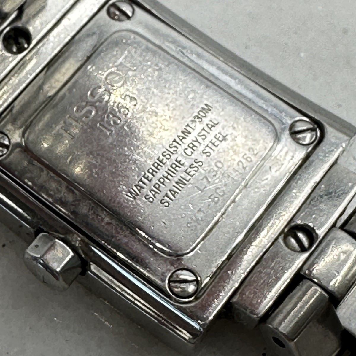 Ladies Tissot L730K Silver Linen Dial Sapphire Crystal Swiss