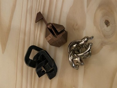 3 Hanayama Cast Puzzles: Vortex, Chain And Flag In Cast Iron