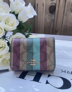 coach small trifold wallet in signature canvas