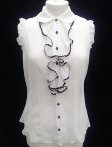 white frilly top
