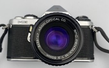 Asahi Pentax ME 35mm SLR Camera w/50mm lens  Black Cover  Strap