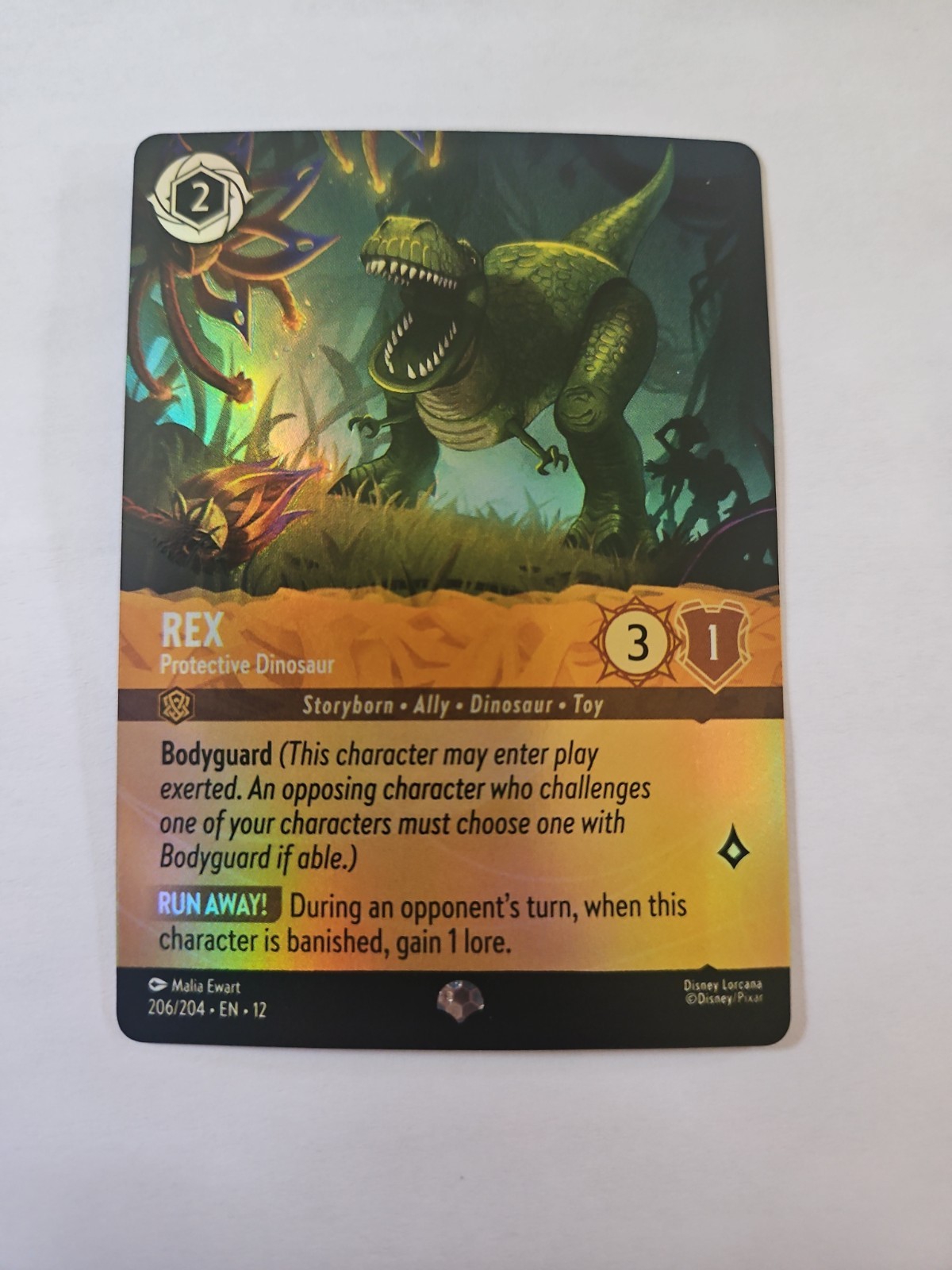 Disney Lorcana Rex - Protective Dinosaur 206/204 Wilds Unknown Epic