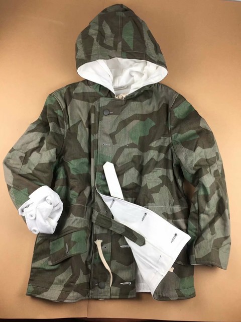 dog holding hoodie