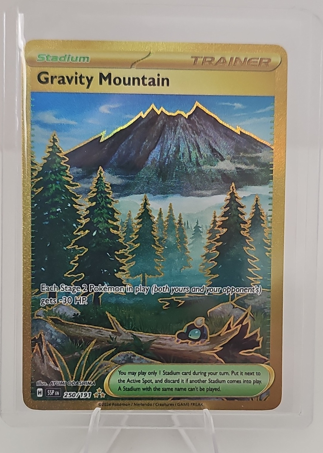 Pokémon Gravity Mountain Gold Trainer Stadium Holo 250/191 SV08 Surging Sparks