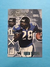 FRED TAYLOR 1999 PLAYOFF PRESTIGE EXP FOOTBALL CARD # EX144 G4348