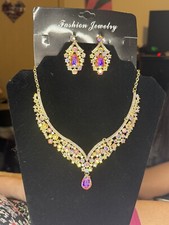 Iridescent stone gold toned necklace and earring set