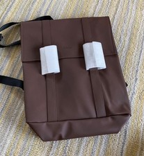 rains waterproof backpack. New. Brown. Unisex.
