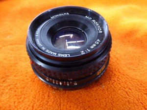 minolta md rokkor 45mm f2 with a filter and front cap. please read