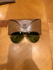 Vintage Bausch  Lomb B L Ray-Ban Aviator sunglasses with a gold frame