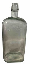 Antique Embossed C. P. Co. Flask Strap Side Clear Bottle with Air Bubbles