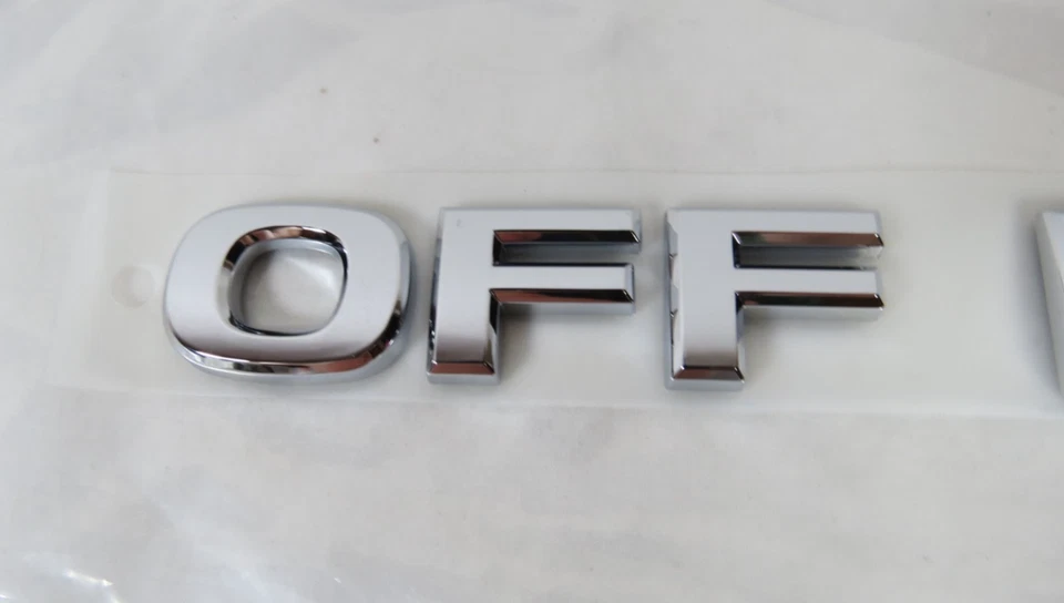 2005-2010 Nissan Xterra Pathfinder Off Road Emblem Front Door Badge Genuine OEM - Image 2 of 4