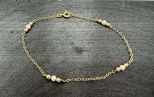 Bracelet en or avec petites perles d’eau douce