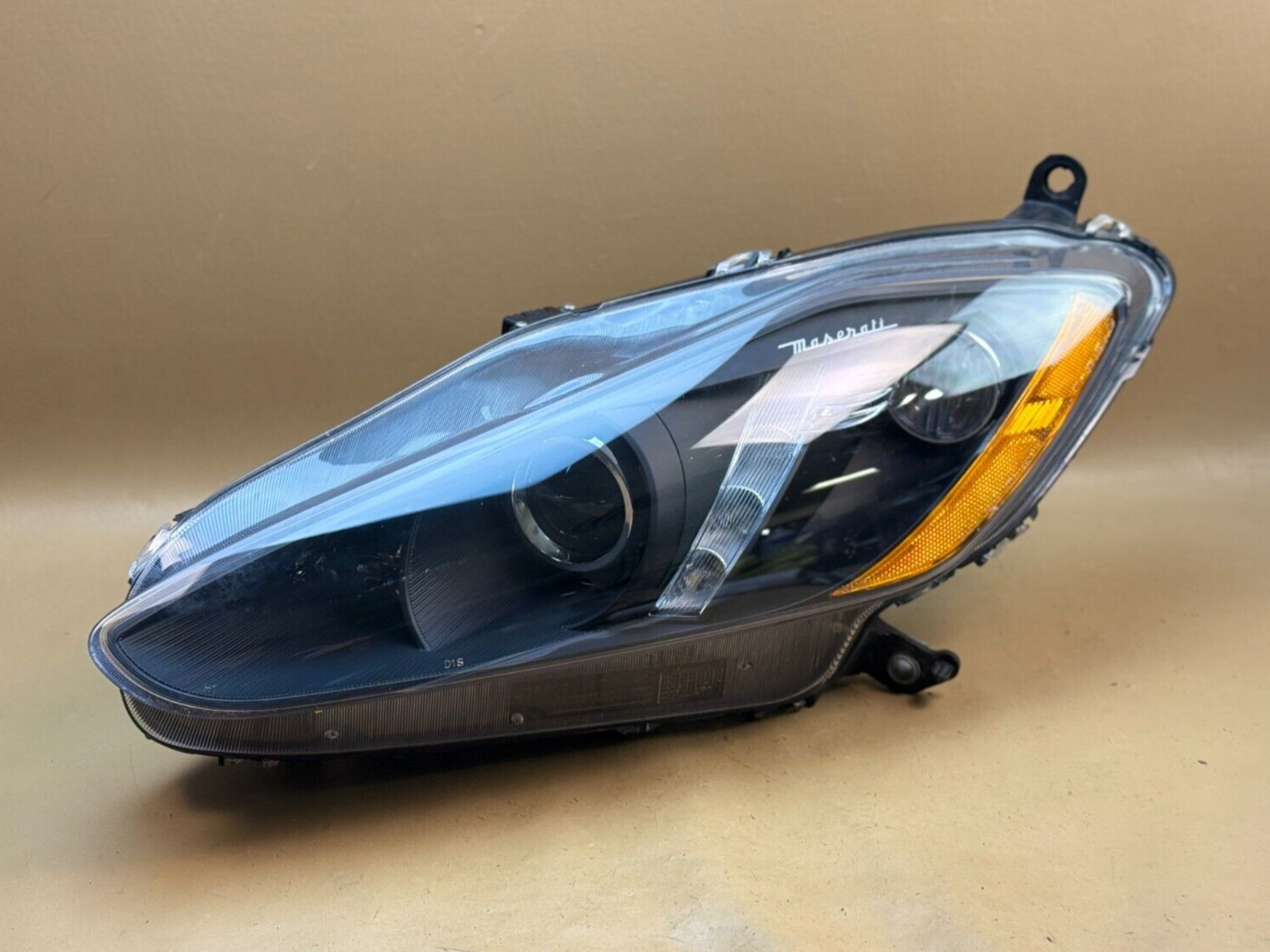 2013-2017 MASERATI GRANTURISMO M145 LEFT XENON HEADLIGHT BLACK W/ WHITE LOGO OEM