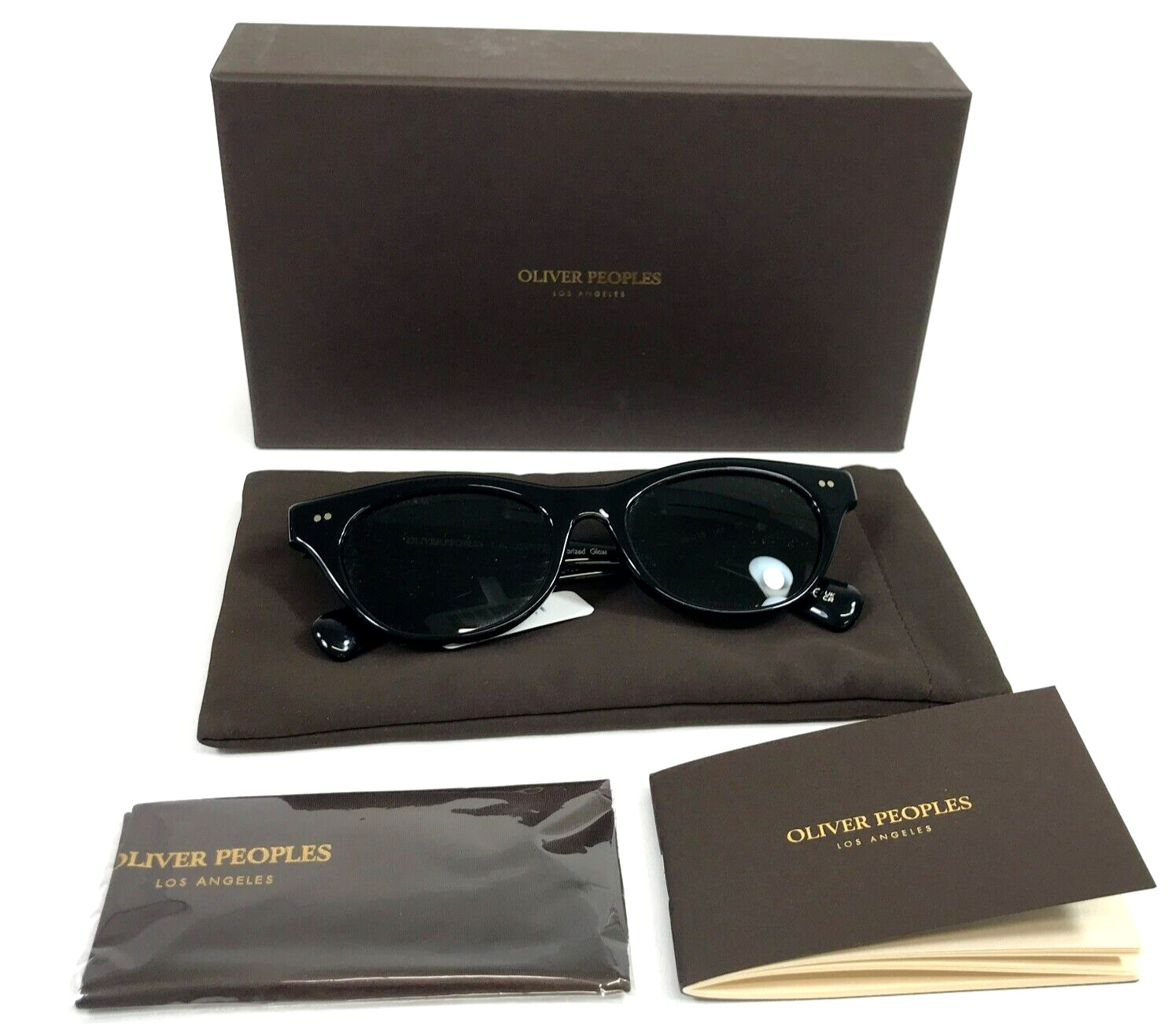 Солнцезащитные очки Oliver Peoples OV5541SU 1005P2 в черной оправе Avelin с оправой Midnight Express