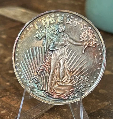 1986 SAINT-GAUDENS FINE SILVER HIGH RELIEF ROUND, 2 OUNCES