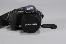 Olympus SP-560UZ 8MP Digital Camera 18x Optic...