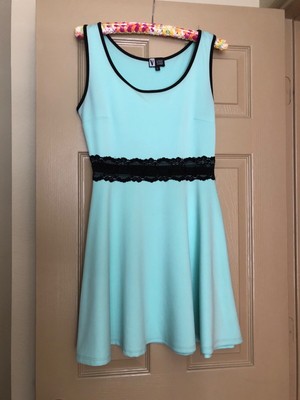 green dress with black lace