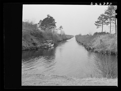 Photo:Unidentified Canal Boat on Narrow Canal 1930s