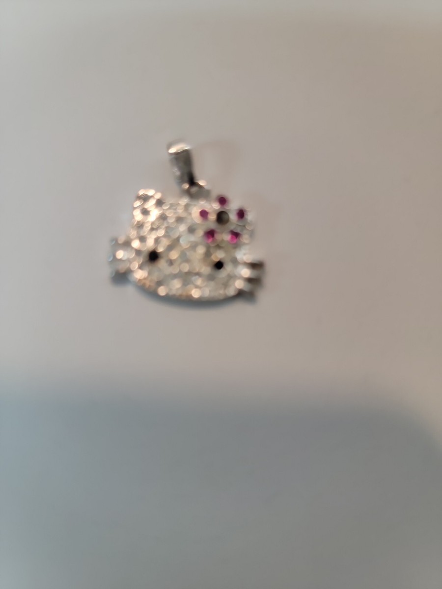 Hello Kitty Carm with Rhinestones. It is marked 76: 11