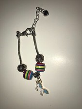3' charm bracelet with extender. Main charm is a unicorn with multi color beads.