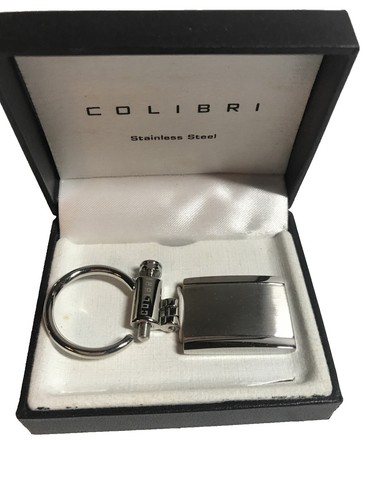 Beautiful Authentic Bally key chain with screw to unlock the latch