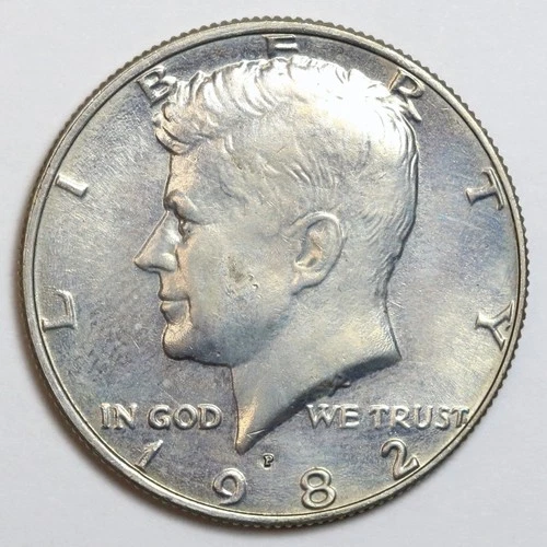 1982-P 50c Kennedy Half Dollar Uncirculated - RAW - Great Coin - Lightly Toned