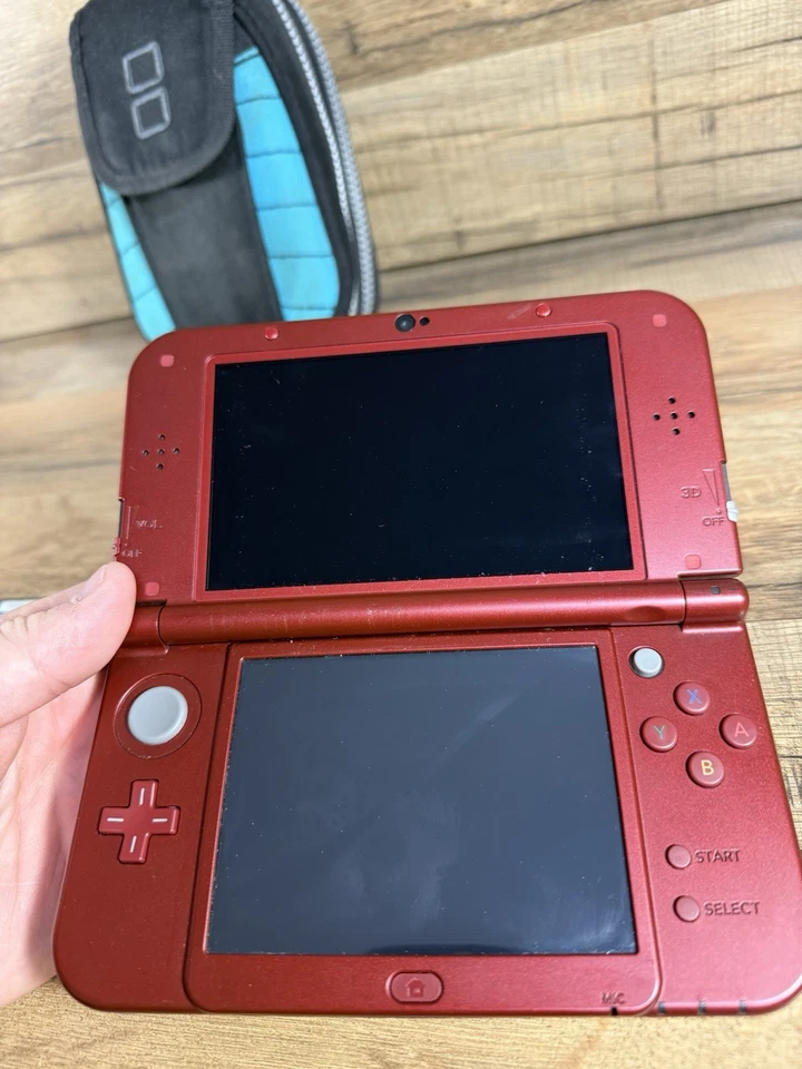 Consola Nintendo NUEVA 3DS LL XL Roja Metálica con Cargador, Juegos y Estuche - Probada Foto 4 de 4