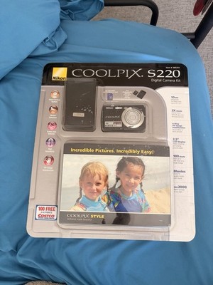Nikon COOLPIX S220 10MP 3X Zoom Digital Camera Purple Smart Portrait VR