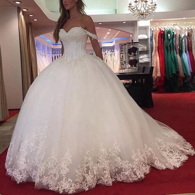 off the shoulder sparkly wedding dress