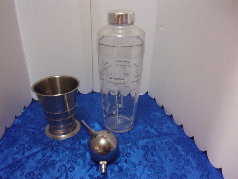 Mid century modern  Cocktail Shaker + bar accessories .Stamped Denmark on cup