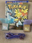 Official Nintendo Pokemon Gold/Silver  Player's Guide with Games & trading cord