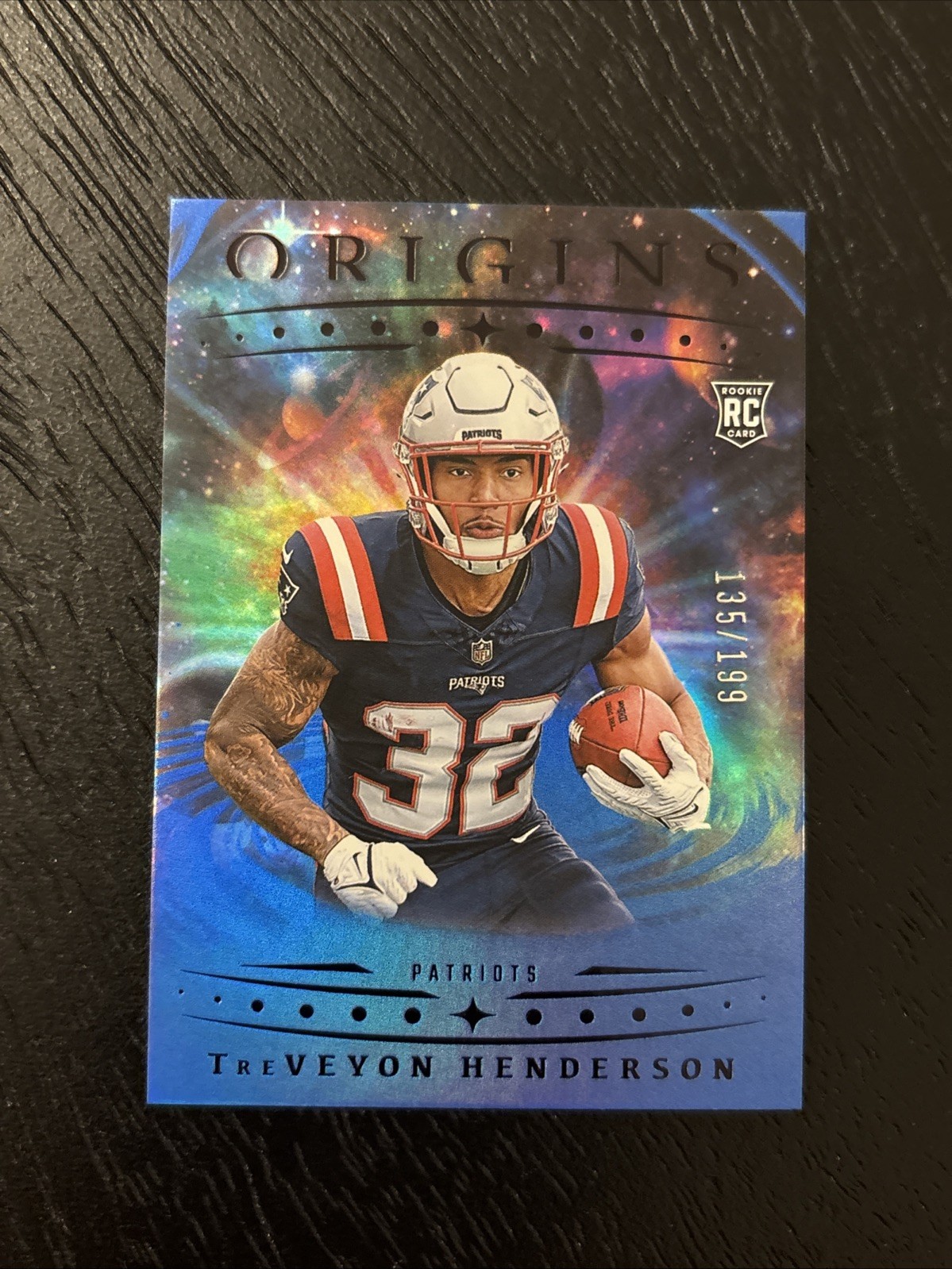 Treveyon Henderson 2025 Panini Origins Rookie Blue /199 #105 RC Patriots