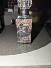 The DUA Brand  Leather Oud Attar