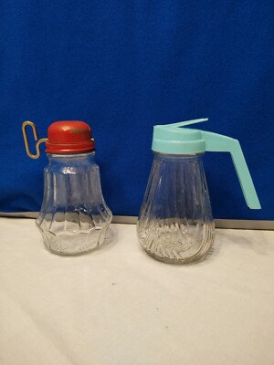 Vintage Red Metal Top Nutcracker And Maple Syrup Glass Containers