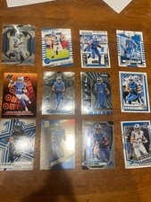 Amon Ra St. Brown (12) Card Lot (Years: 2022, 23, 24, and 25) Base and inserts