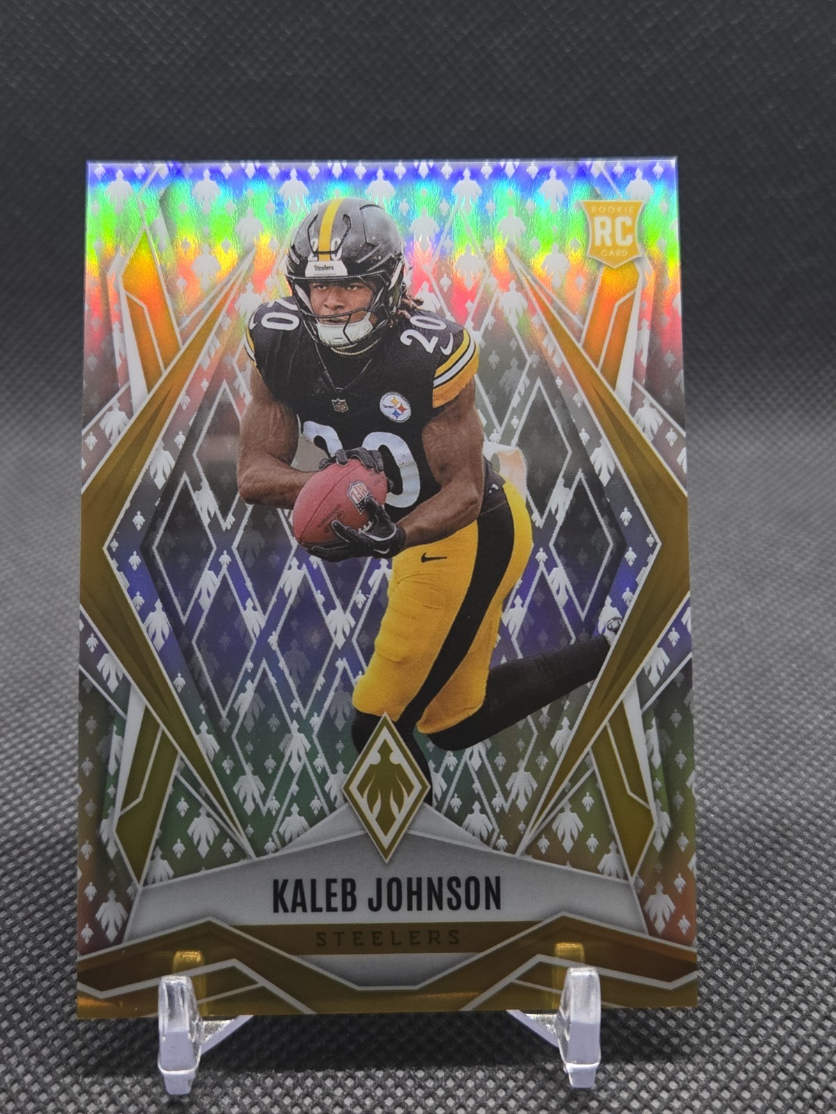 2025 Panini Phoenix Kaleb Johnson RC /149 Silver Holo Logo #182 Steelers