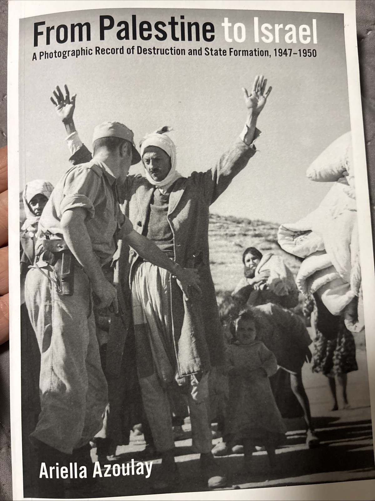 From Palestine to Israel: A Photographic Record of Destruction and State Format,