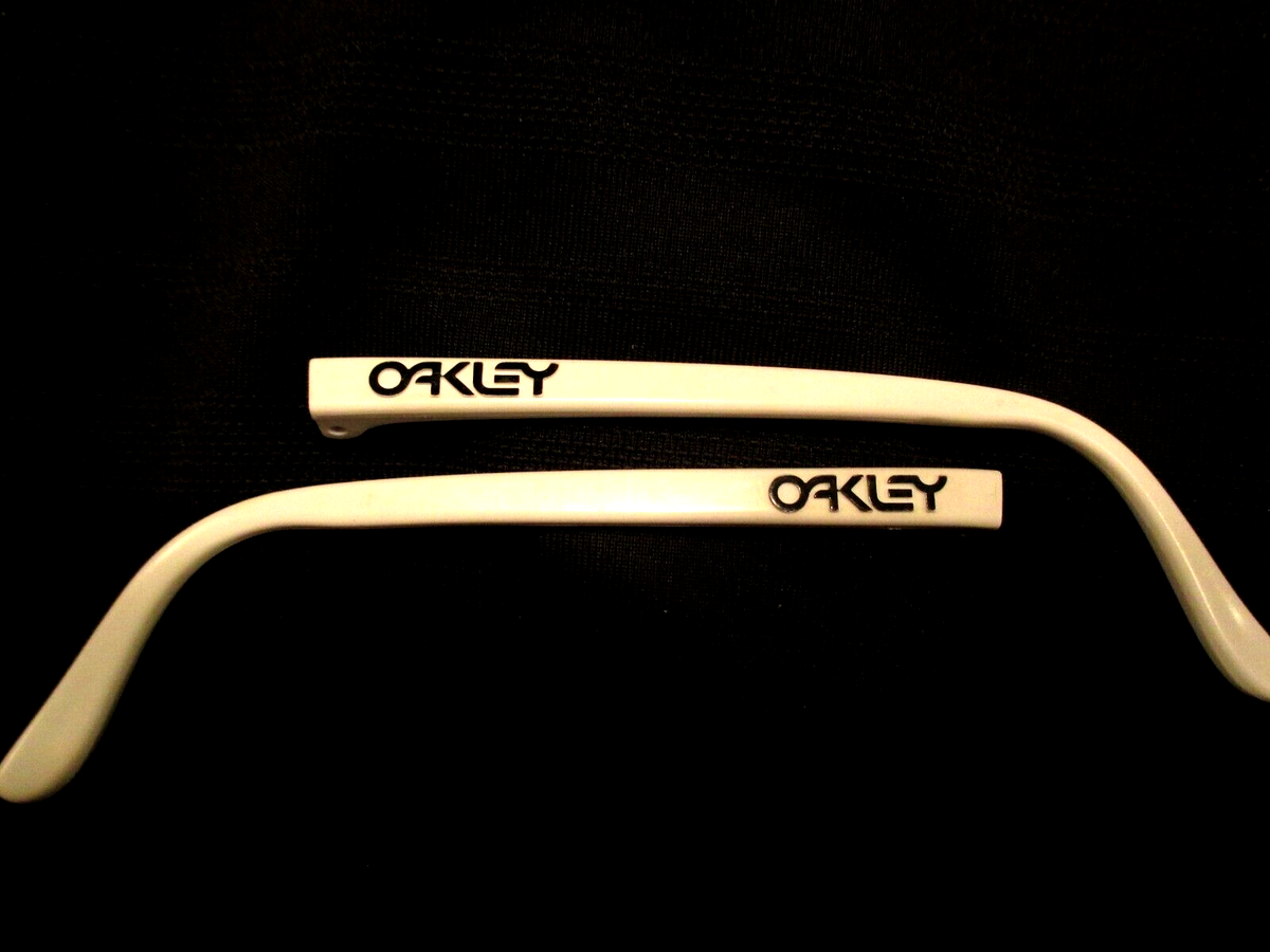OAKLEY RAZOR BLADES 2 WHITE EARPIECES NEW STRAIGHT ARM STEM BLACK