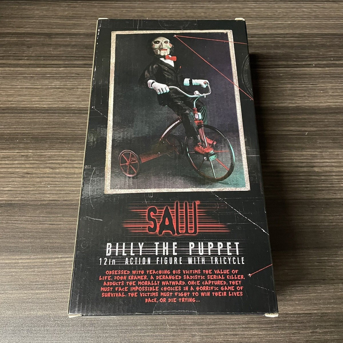 NECA: Saw - Billy the Puppet on Tricycle 12