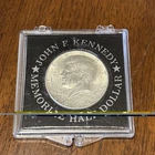 1964 Kennedy Silver Memorial Half Dollar in "The Singer Company" Holder May 1964